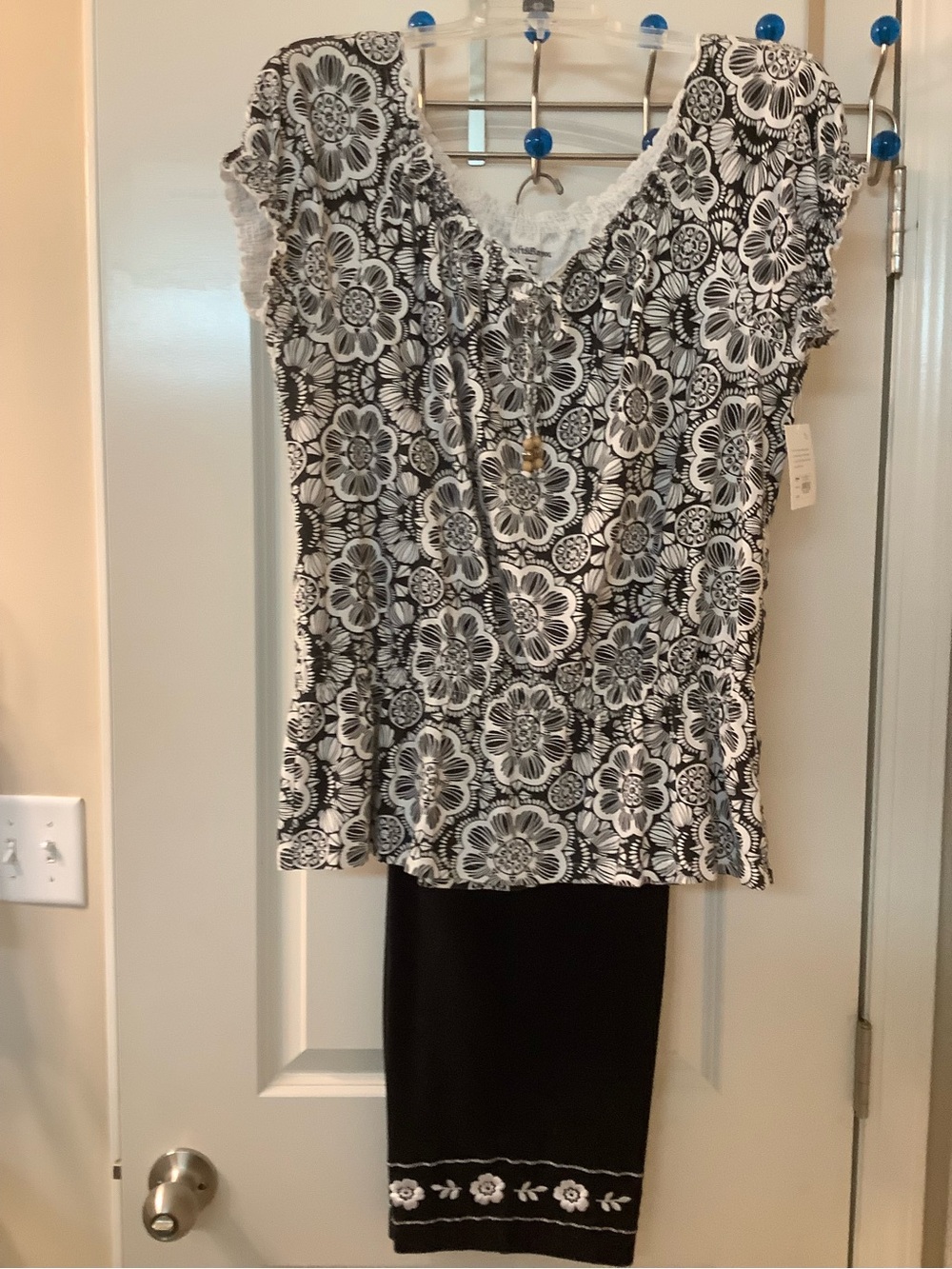 Cathy Daniel’s black Capris w/flower embroidery & Croft&Barrow top